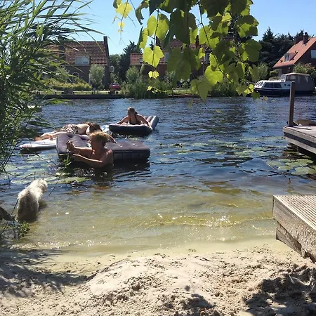 Houseboat Between Windmills